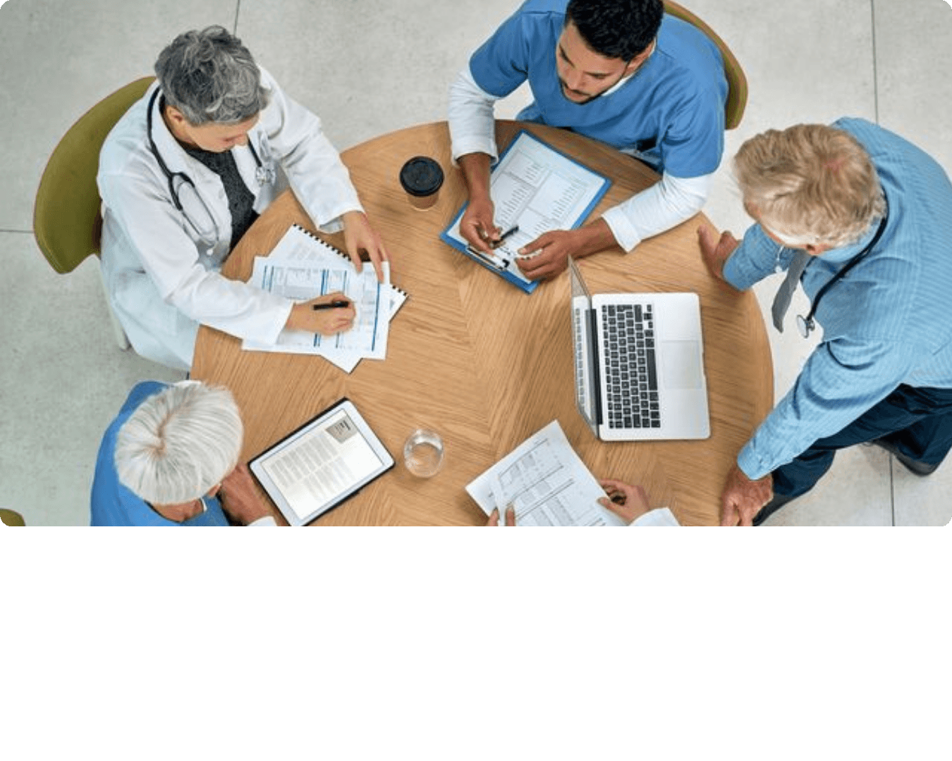 Healthcare professionals collaborating around a table