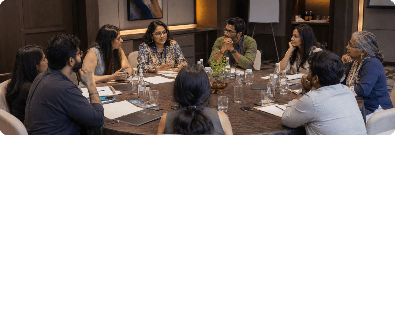 Group of professionals collaborating around a meeting table